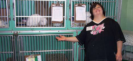 photo of girl working in an animal shelter