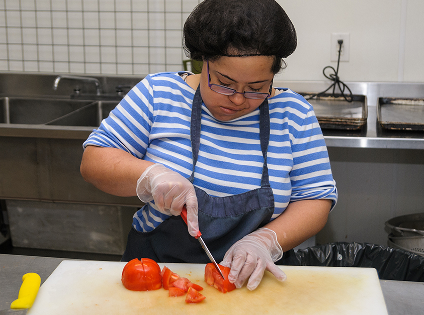 woman chopping vegatibles