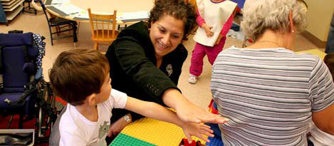 Photo of child and teacher exploring personal space