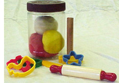 photo of playdough and various cutters