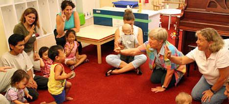 photo of teacher using a sign at circle time