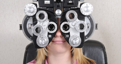 photo of a girl getting her vision tested